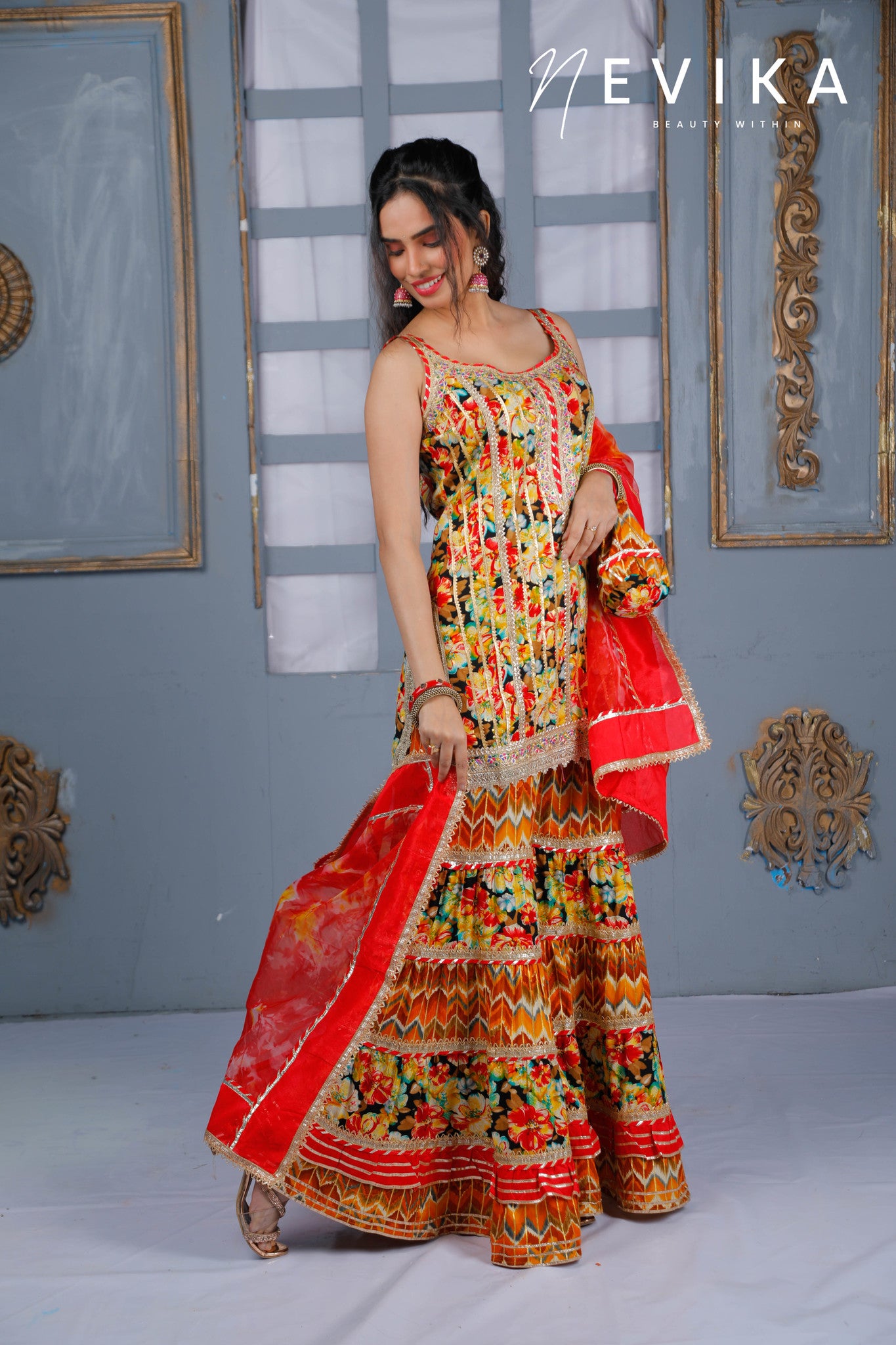 Mesmerize  in Indian Red Sharara Dress for Festival Elegance