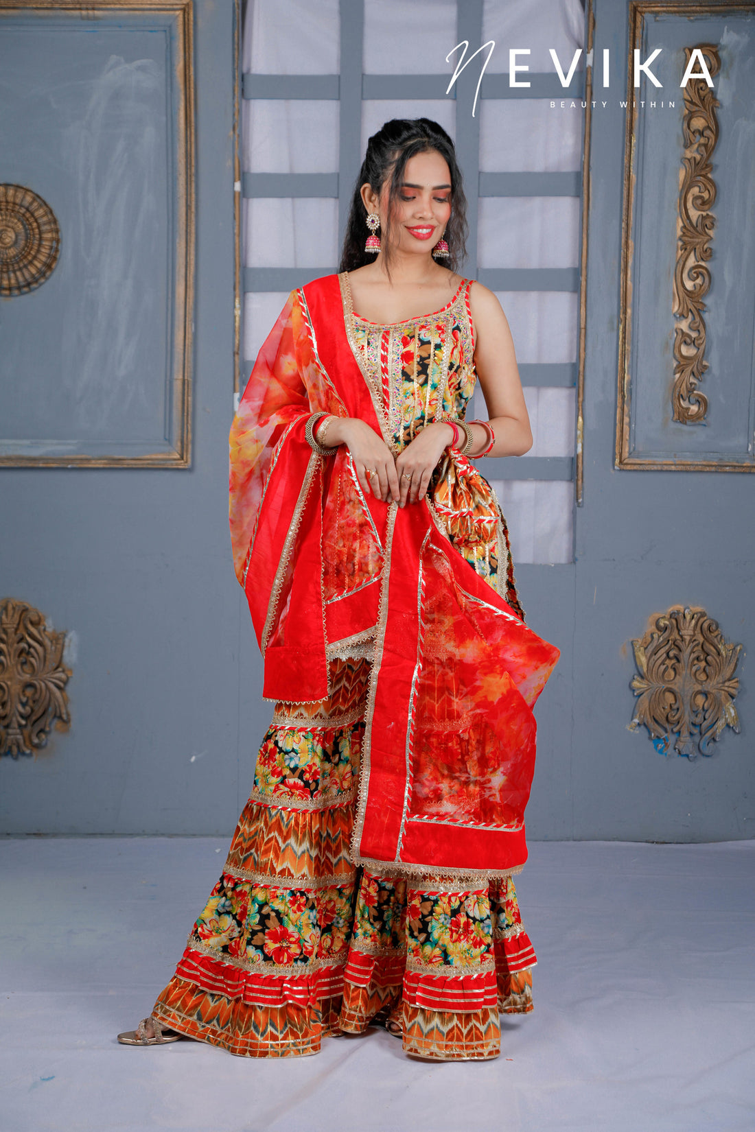 Mesmerize  in Indian Red Sharara Dress for Festival Elegance